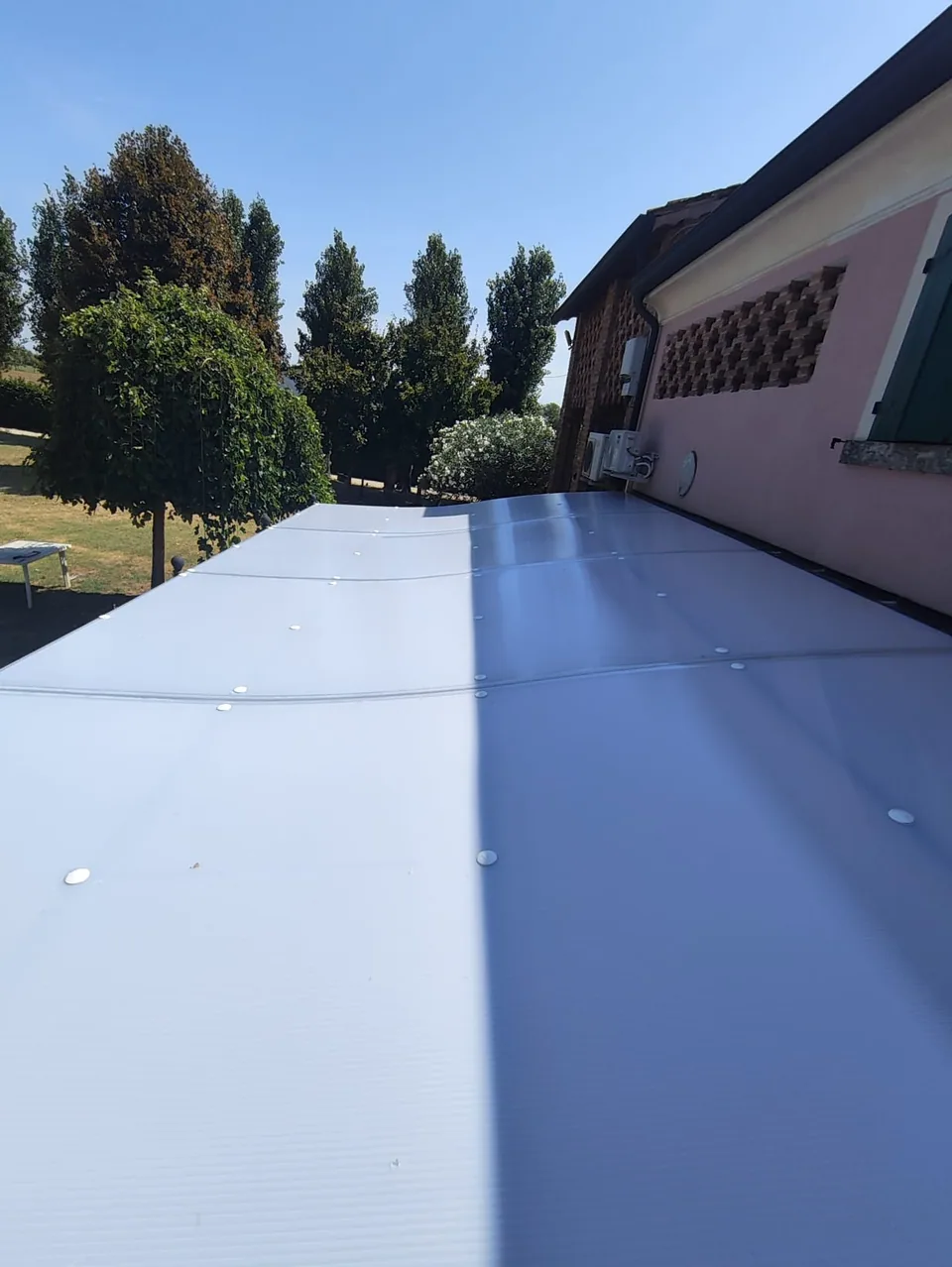 Completed polycarbonate roof, looking along the slope