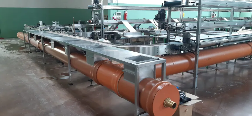 Screw conveyor installed at the plant next to the processing line