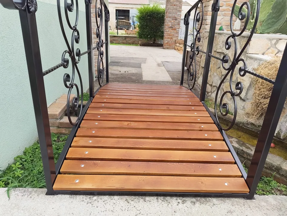 Timber deck seen from above between the two railings