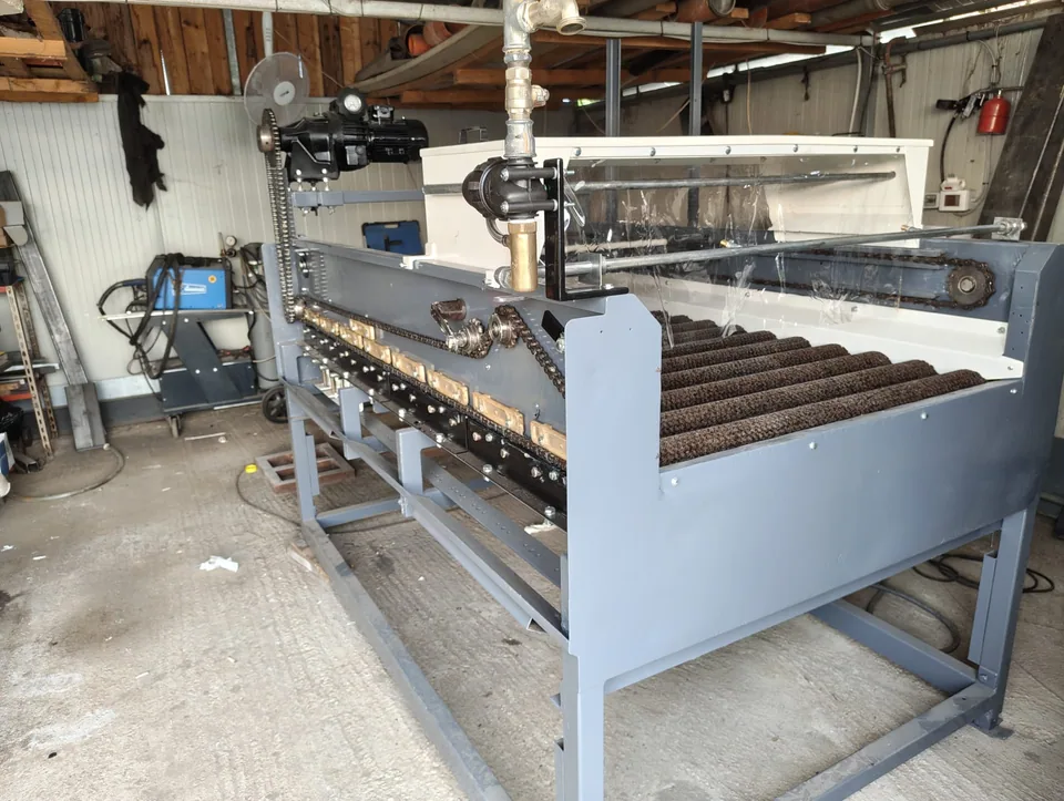 Overhauled and repainted machine, complete with new brushes, in the workshop