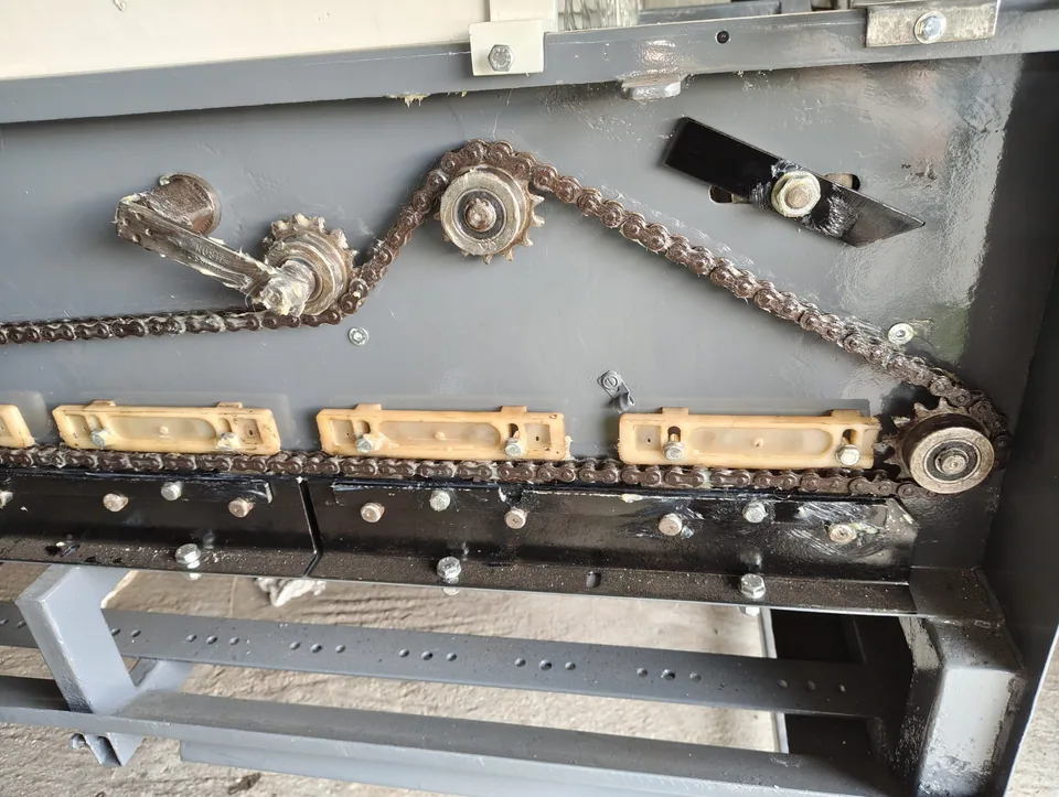 Close-up of the chain drive with sprockets and tensioner reassembled