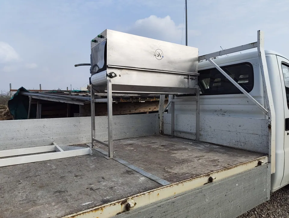 Overhauled machine loaded onto the flatbed for delivery